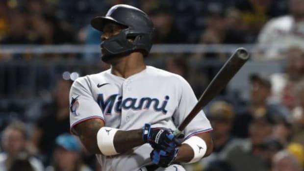 Sep 30, 2023; Pittsburgh, Pennsylvania, USA; Miami Marlins designated hitter Jorge Soler (12) drives in a run with a fielders choice infield hit against the Pittsburgh Pirates during the sixth inning at PNC Park.